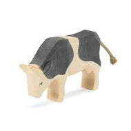 Ostheimer Cow - Black and white - eating