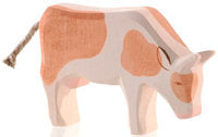 Cow - Brown and white - eating