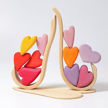 Load image into Gallery viewer, Grimm’s Wooden hearts - reds/pinks